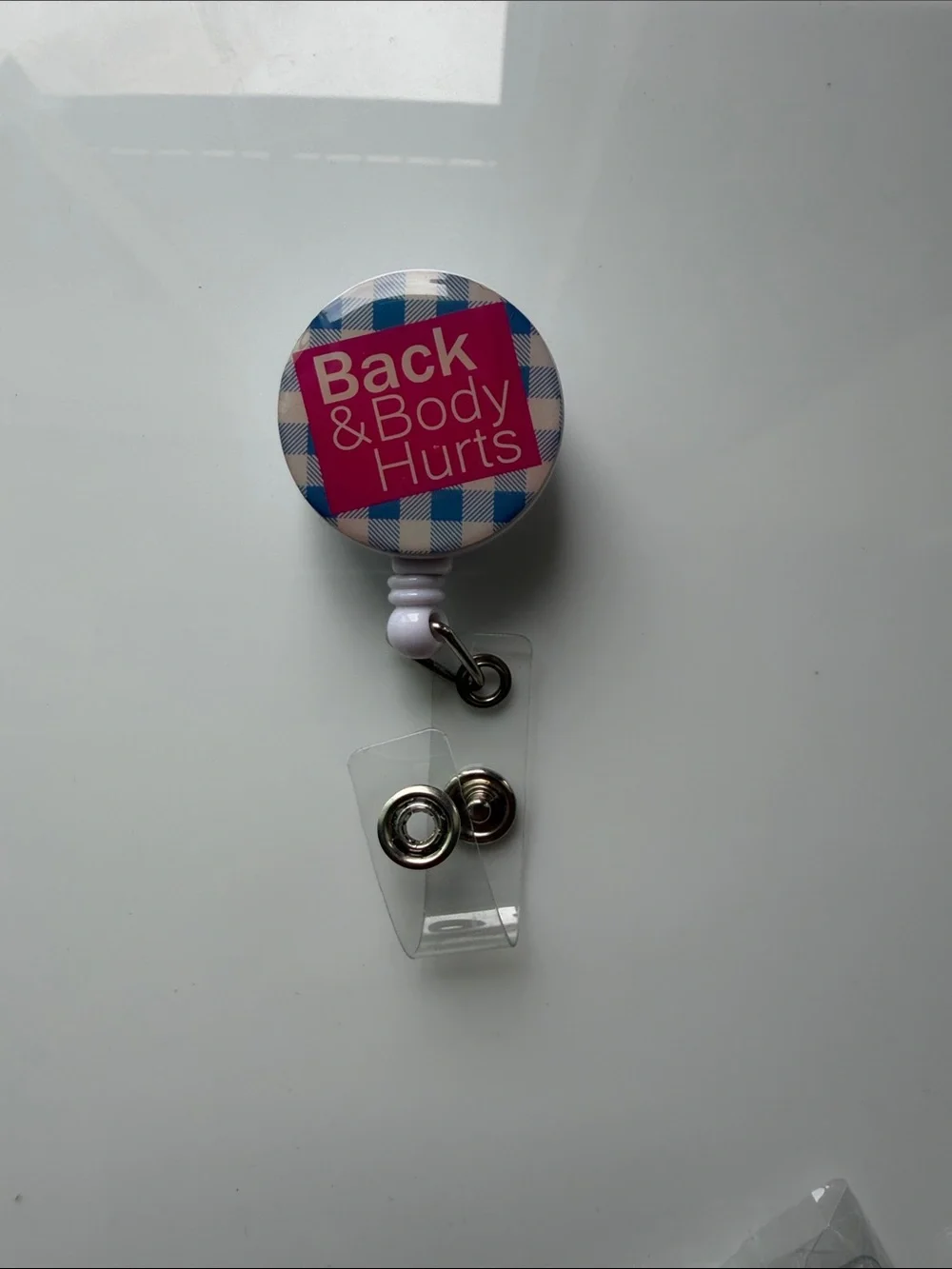 Back & Body Hurts badge reel